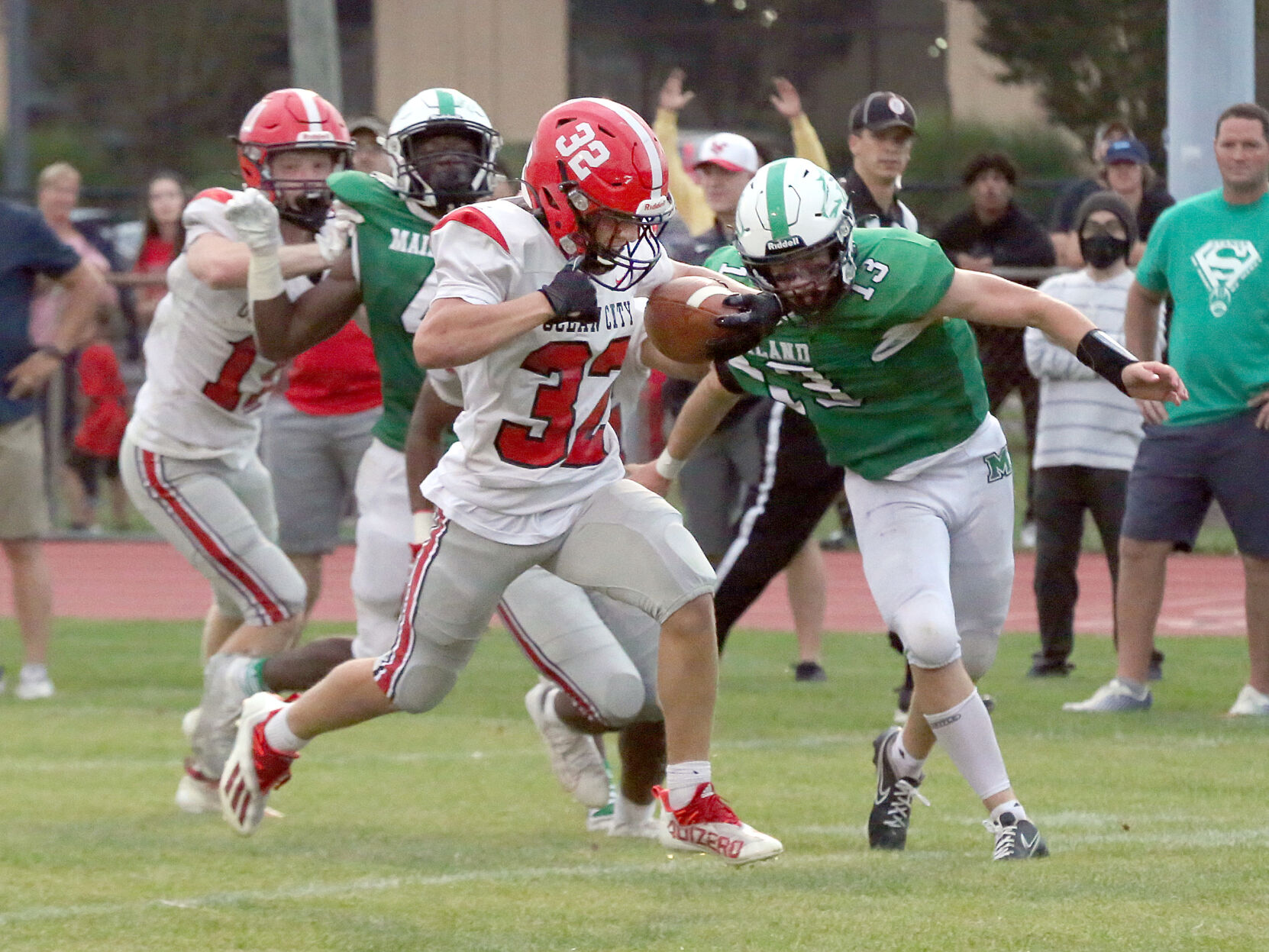 Main football photo for B1 for Saturday, Sept. 18